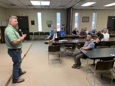 Crawford speaking to farmers photo