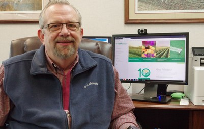 Vic Ford at desk photo